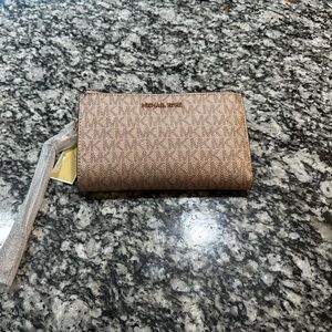 Rose Gold Michael Kors wristlet